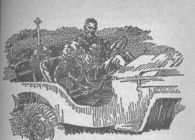 Louis Bromfield in his jeep with two Boxers
