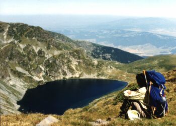 backpacker contemplating